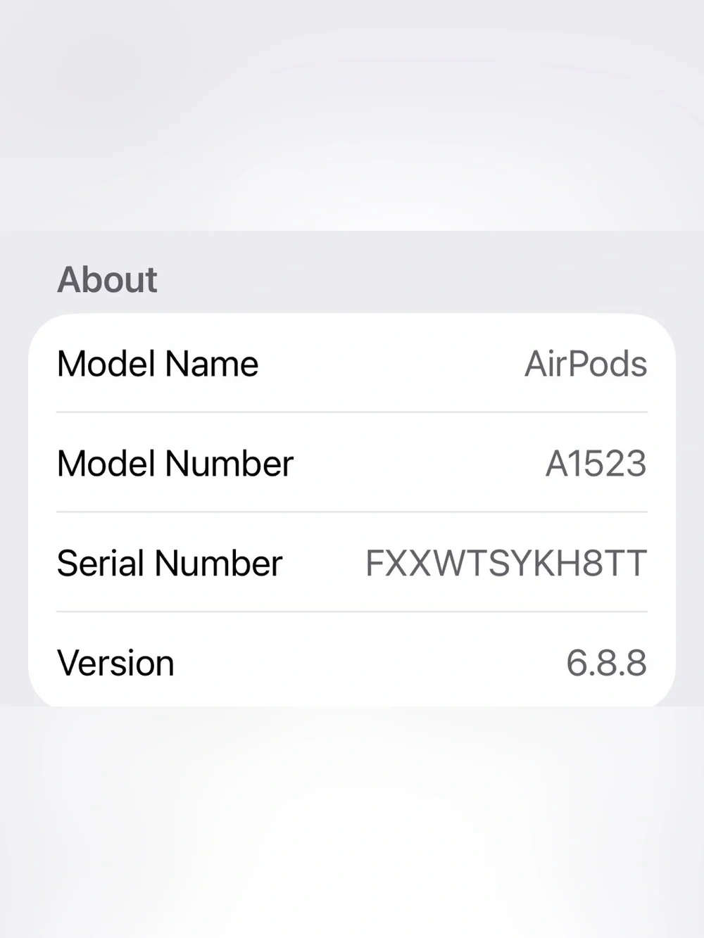 Apple White Wireless AirPods with Charging Case and silicone carrier.